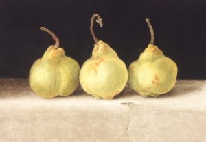 Three yellow greenWilliams Pears on an old shelf